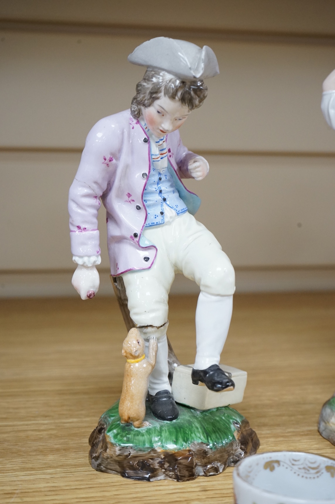 A pair of 19th century Hochst Damm faience figures and a Meissen twin section salt, tallest figure 20cm